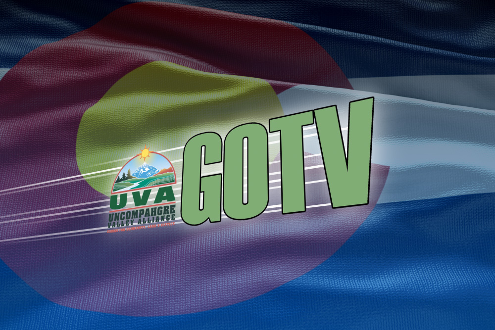 The Uncompahgre Valley Alliance logo and the acronym "GOTV" are seen at an angle over a Colorado flag